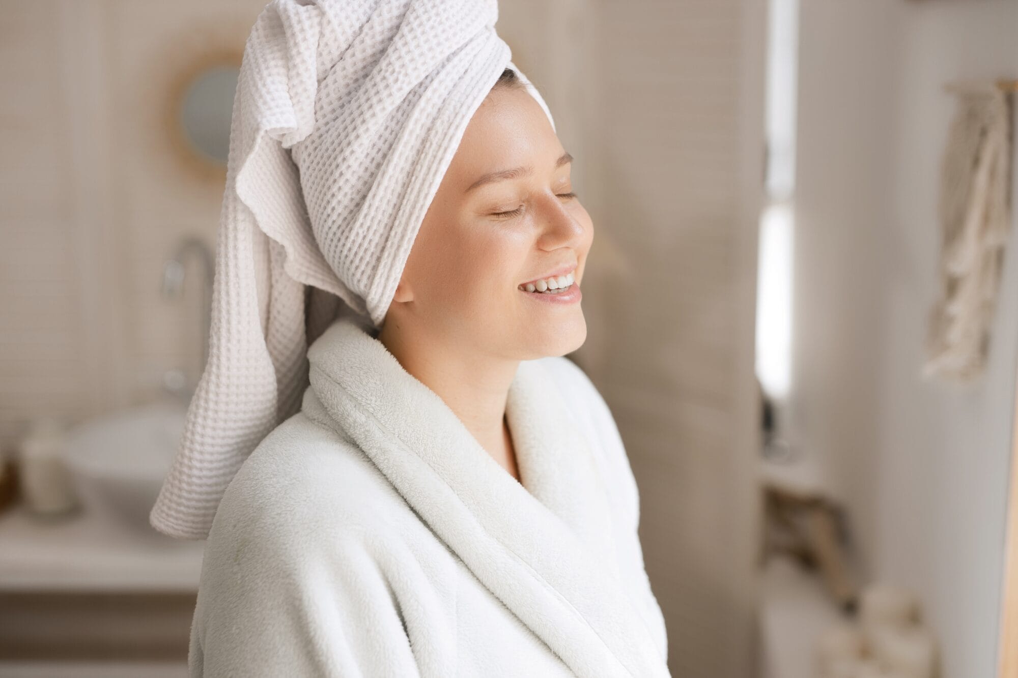 woman smiling in bathroom